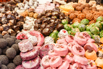 Many colorful delicious sweet candies close-ups at a children's party
