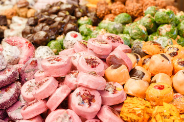 Many colorful delicious sweet candies close-ups at a children's party