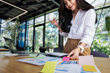 business people post it notes idea discussing and planning in office table, business concept