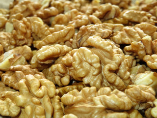 Peeled walnut kernels. Heap of walnuts closeup