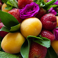 composition of ripe fruit, strawberry and rose