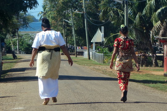  Traditionally dressed Tongan women going to church on Sunday at Neiafu, Vavau, Tonga