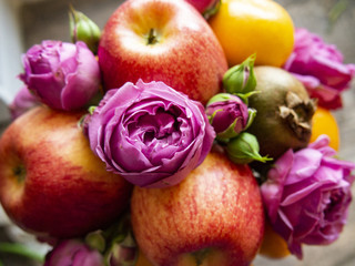 composition of ripe fruit and rose