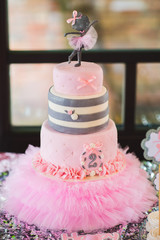 Pink birthday cake with number two on it