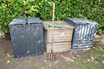 three compost bins for a collaborative and ecological building
