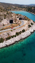 Aerial drone bird's eye view photo of Tunnel in Athens riviera seaside road known as hole of...