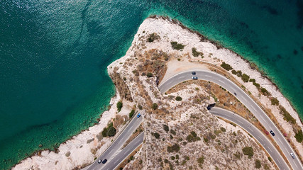 Aerial drone bird's eye view photo of Tunnel in Athens riviera seaside road known as hole of...