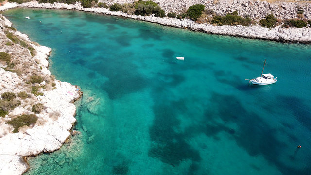 Aerial drone bird's eye view photo of Tunnel in Athens riviera seaside road known as hole of Karamanlis, Attica, Greece