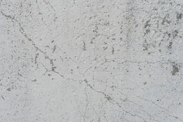 Fototapeta premium Wall fragment with scratches and cracks