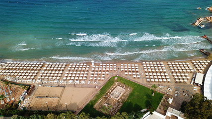 Aerial drone bird's eye photo of famous celebrity wavy sandy beach of Astir or Asteras in south...