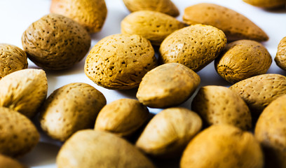 Fototapeta na wymiar Fresh almonds in shell close up