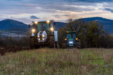 Tractor plowing fields.