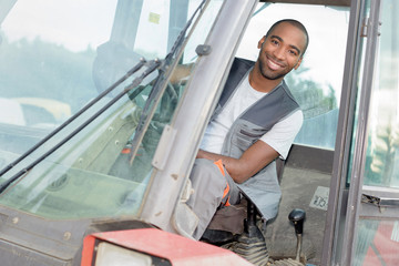 Portrait of man in tractor cab