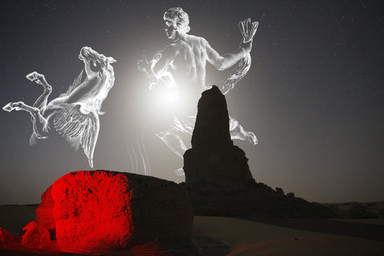 Egypt, White Desert, calcareous concretion called The finger, stars and the Moon in background. The constellations of PEGASUS and Aquarius rise with the Moon.