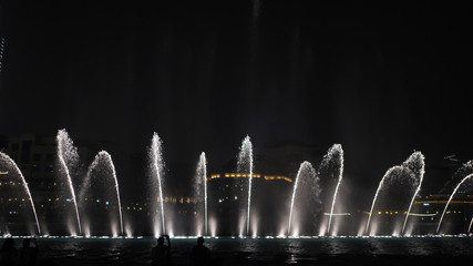 Beautiful dancing fountains in Dubai in night time.