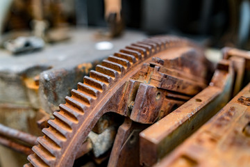Old printing press - rotary machine - polygraphic equipment - big cog wheel