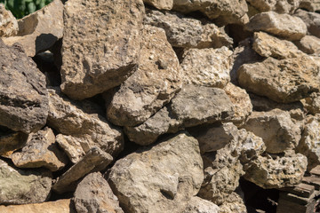close up of pile of stones outdoors under sulight