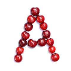 Letter A made with cherries to form a letter of the alphabet. Berry letters on a white background.