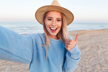 Close up of lovely young girl in summer hat