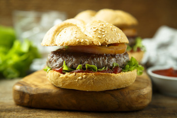 Beef burgers with tomato and lettuce