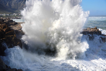 Huge waves crashing into shoreline