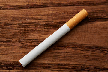 cigarettes close-up on a wooden background. Drug addiction. Smoking of tobacco. cancer. Nicotine....