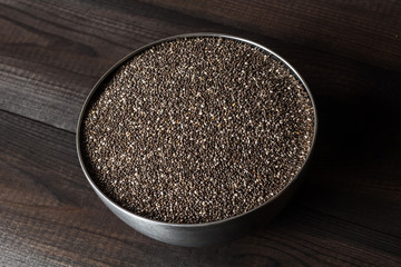 chia seeds in metal bowl. salvia hispanica