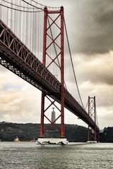 25th April Bridge in Lisbon on a cloudy day