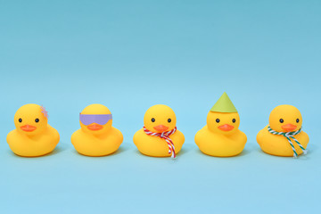 Diversity concept, Difference rubber ducks manage to line up.