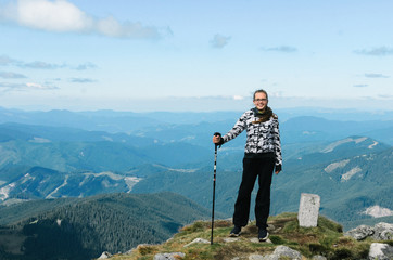 a woman tourist mountain delight