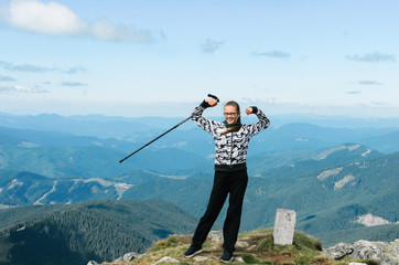 a woman tourist mountain delight
