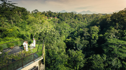 Drone aerial view of wedding ceremony at luxury hotel