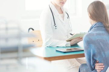 Woman during consultation with gynecologist