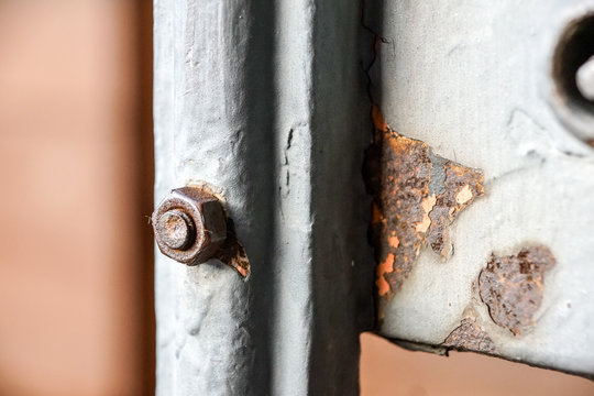 row of bolt, screw and nuts closeup - steel construction detail