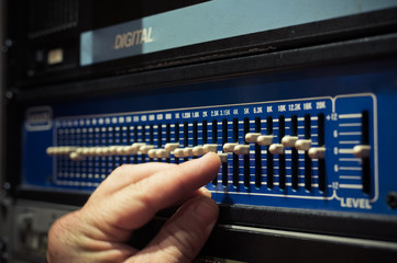 Levels fine tuning on professional electronic equalizer audio equipment