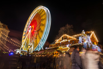 Amusement park by night during weihnachtsmarkt in Magdeburg, Germany