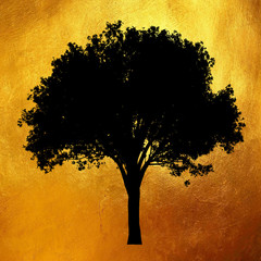 Tree with leaves silhouette isolated on shiny golden texture pattern abstract background. Graphic element for print and design.