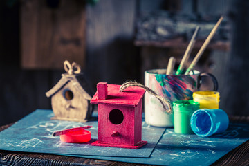 Project of small home for birds in wooden workshop