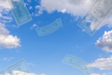 Collage. Mirage - against the blue sky flying transparent dollars.