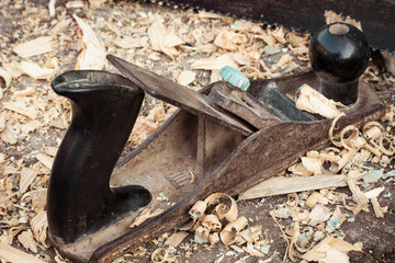 Tools carpenter - plane and sawdust, grunge effect