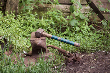 Hammer and anvil, tools of a blacksmith
