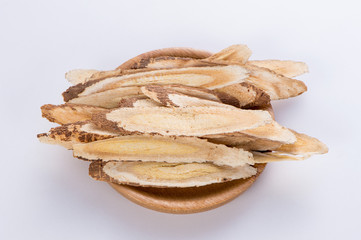 Chinese herbal medicines -- Astragalus on white background, blank for text copy space,