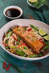 salmon with noodles and vegetables