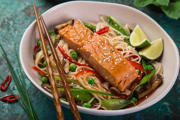 salmon with noodles and vegetables
