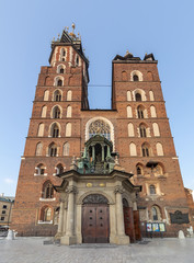 Gothic Saint Mary Basilica in city center of Krakow, Poland with a text in Polish that means "The Jubilee Church of the Year 2000"