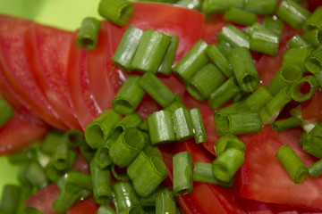 sliced tomatoes and green onions