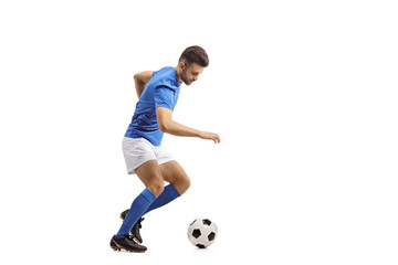 Obraz premium Soccer player dribbling