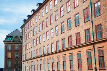 urban scene with historical building and clear blue sky, copenhagen, denmark