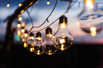Little yellow lamps shine in the darkness