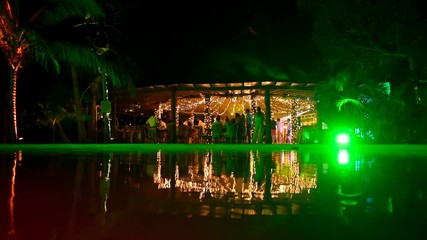 Cinemagraph of a party by the pool